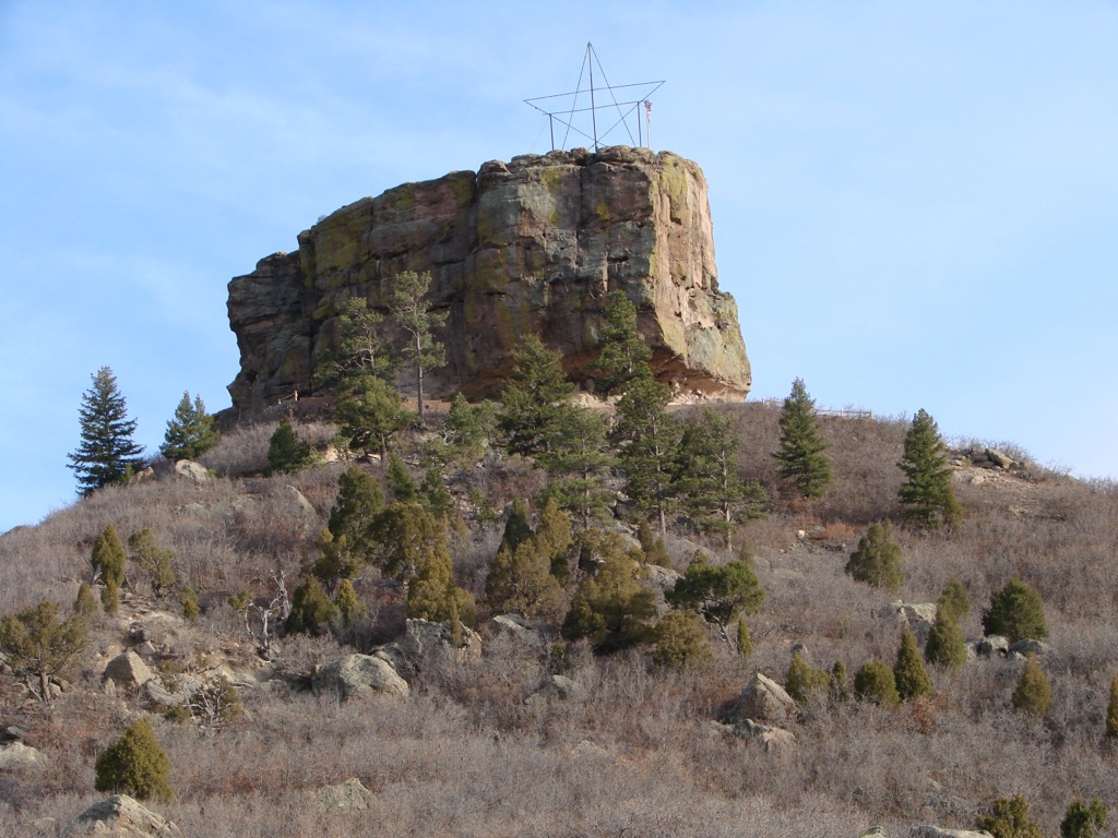 The sandstone butte that gives Castle Rock its name, under a clear sky