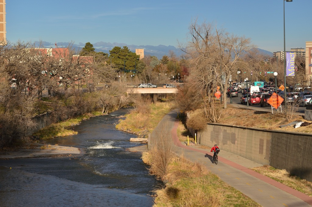 The Cherry Creek Trail beside the creek, with the foothills in the distance