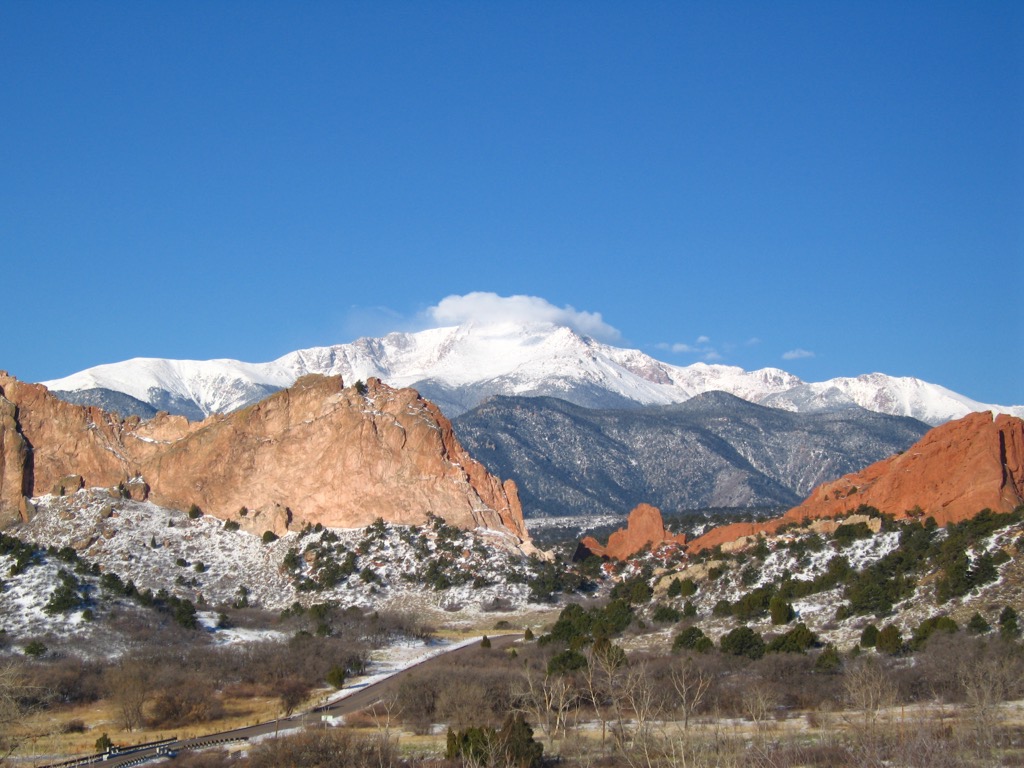 Snow-covered Pikes Peak above Garden of the Gods
